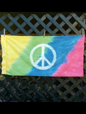 image of colorful pillowcase with a white peace sign