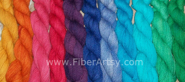 image of skeins of yarn dyed different solid colors