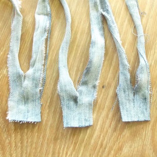 image of strips of light blue denim