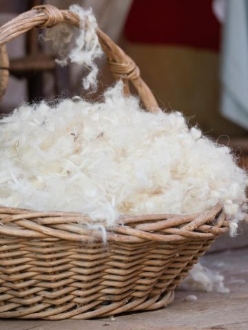 a basket full of white wool